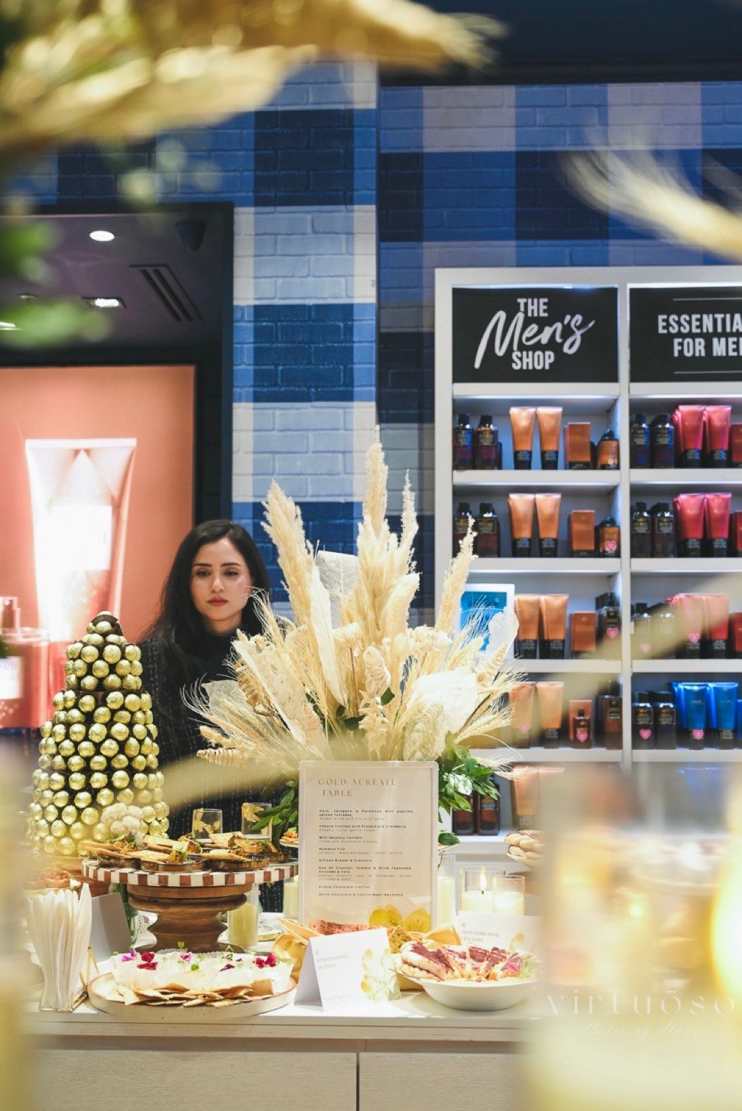 Aarti Sharma, our co-founder, beside the gold truffle tower ahead of the launch.